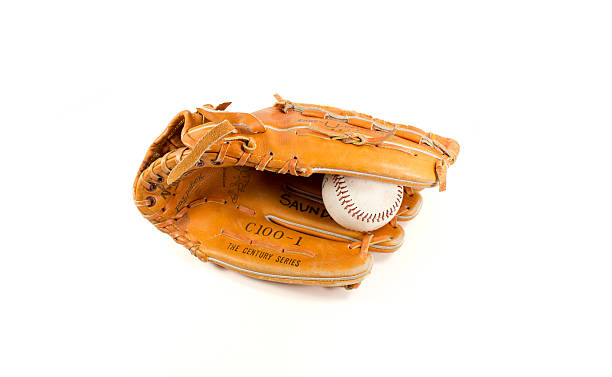 Baseball Glove with ball An isolated glove holding a basball  on white. clothing north america usa massachusetts stock pictures, royalty-free photos & images