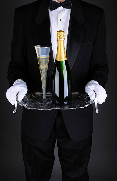 istock Waiter with Champagne on Tray 530324519
