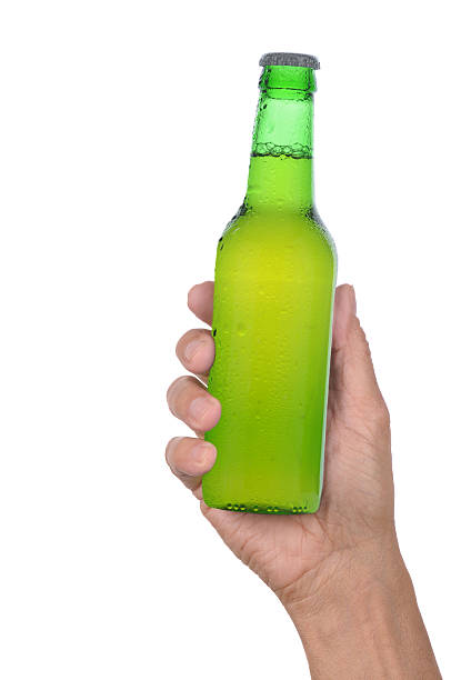 istock Hand Holding Bottle of Beer 530324787