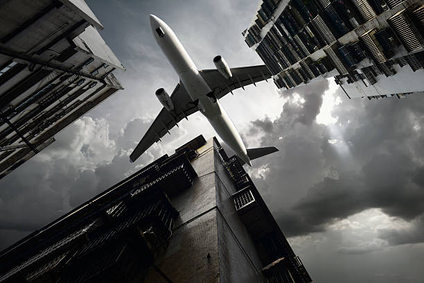istock Airplane flying over Hong Kong Housing 530324935