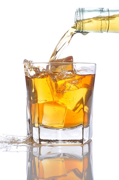 istock Whiskey pouring into Glass 530326239