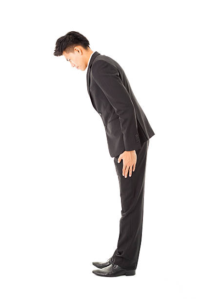istock side view asian businessman with bow 530334183