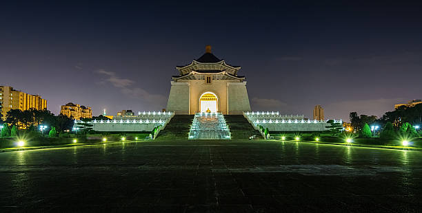 Chiang Kai-Shek Memorial Hall in Taipei at Night, Taiwan Panorama of the National Chiang Kai-Shek Memorial Hall at Night. The Chiang Kai Shek Memorial Hall is located on the Liberty Square (Freedom square) in the city of Taiwan. This monument was built in memory of Chiang Kai-shek, former President of the Republic of China (Taiwan). Taipei, Taiwan. chiang kai shek photos stock pictures, royalty-free photos & images
