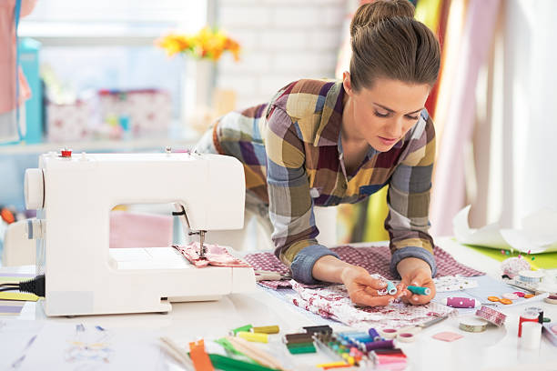 istock portrait of needlewoman at work 530335029