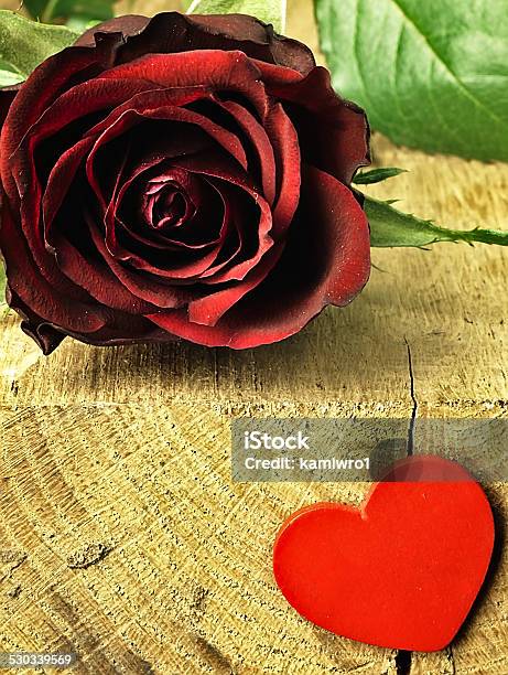 Red Rose And Red Heart On A Wooden Table Stock Photo - Download Image Now - Anniversary, Beauty In Nature, Blossom