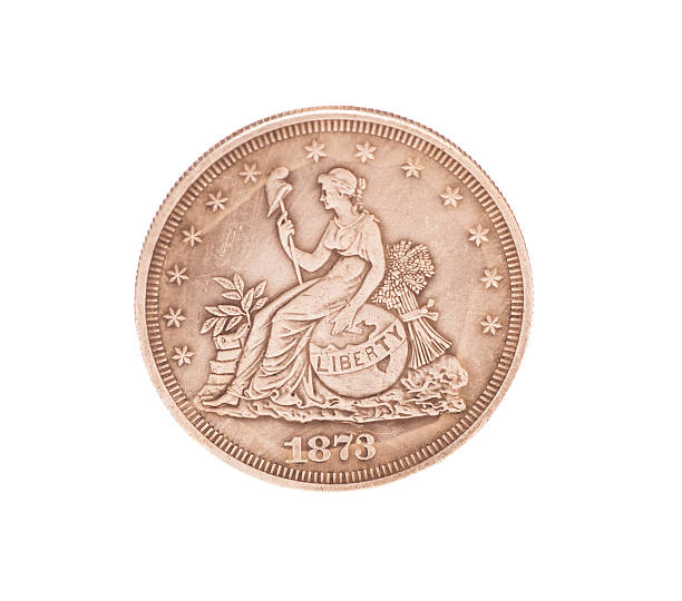 istock antique silver dollar isolated on white background 530340265