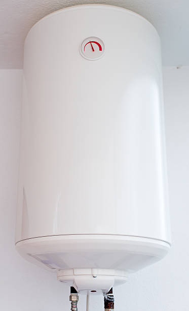 istock Modern electric water boiler on the wall. 530353235