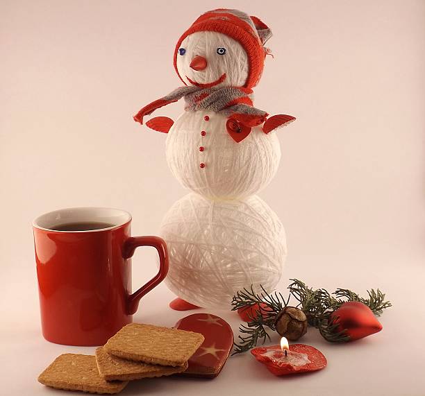 istock New Year composition with snowman and tea 530354599