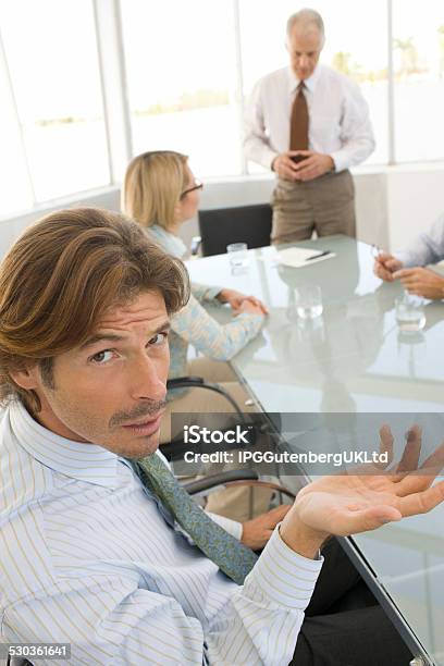 Business Man In Conference Meeting Stock Photo - Download Image Now - Office Politics, Contented Emotion, Corporate Business