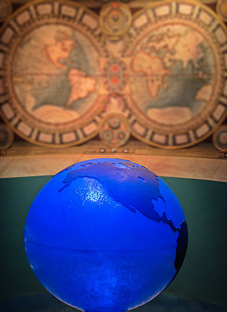 istock Blue globe against map of the world. 530362117