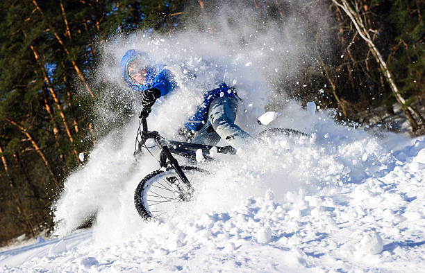istock Cyclist snow mountain bike 530363765