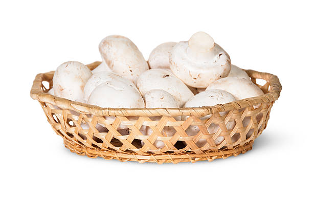 istock Mushrooms Champignon In A Wicker Basket 530366981