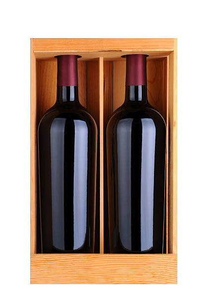 istock Two Red Wine Bottles in Wood Case 530368467