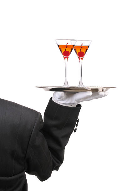 istock Butler with Wine Glasses on Tray 530379115