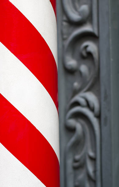 istock Barbershop Pole on Old Building (Close-Up Detail) 530380023