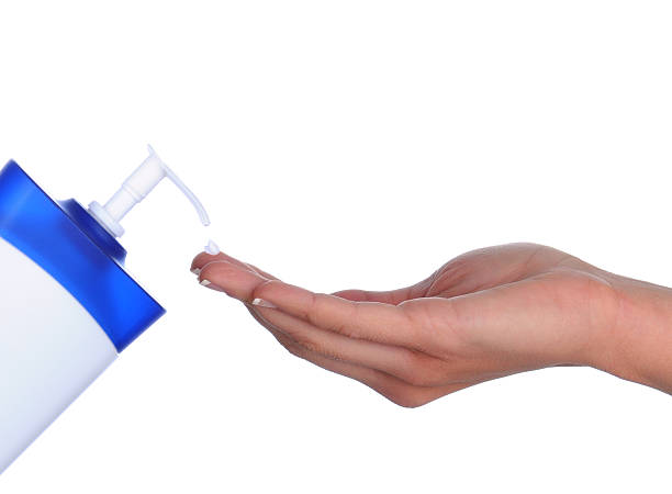 istock Woman's hand with drop of Lotion 530380855