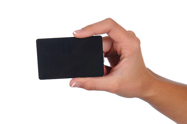 istock Woman holding Black Gift Card 530380873