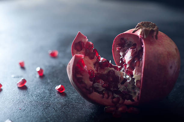 Pomegranate fruits on wooden table  ,