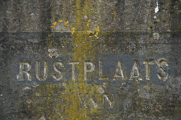 Tombstone  with the text: rustplaat ( meaning= resting place) 