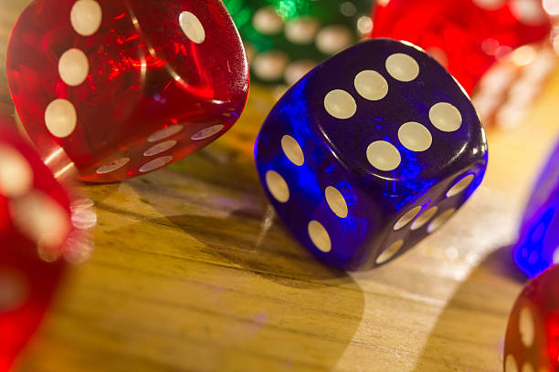 istock colorful dices background on wood 530382889