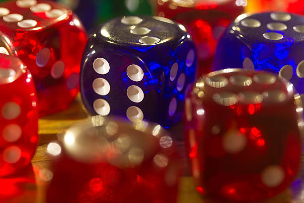 istock colorful dices background on wood 530382897
