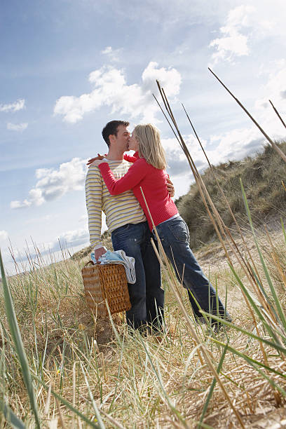 istock Couple Kissing And Embracing On Beach 530382941