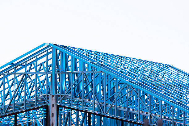 istock House construction steel frame against white background with copy space 530389477