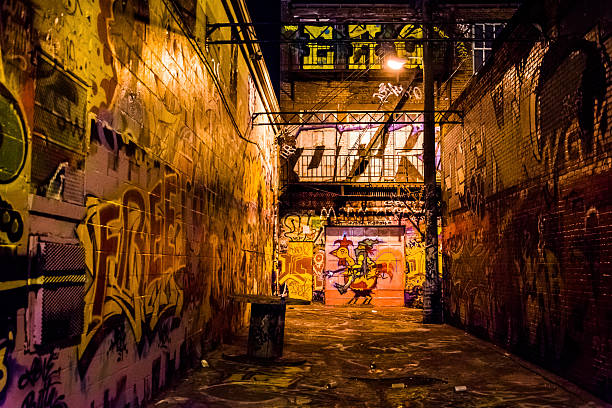 Graffiti Alley at night, in Baltimore, Maryland. stock photo