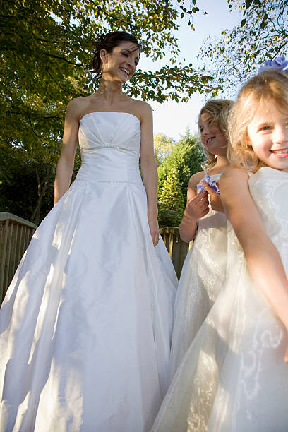 istock Bride With Two Flower Girls 530393323