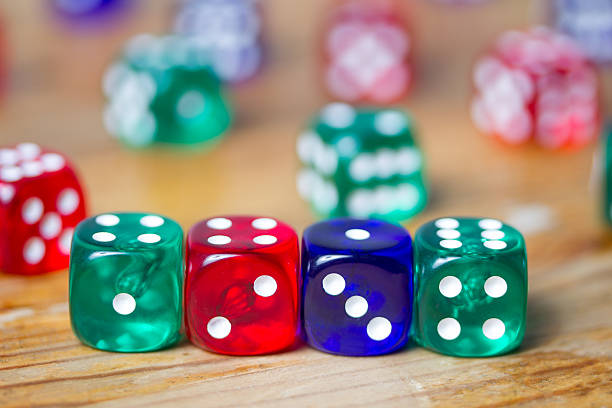 istock colorful dices background on wood 530393561