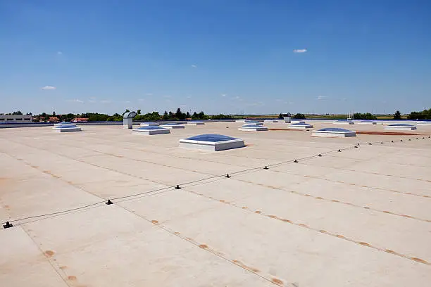 Photo of flat roof on industrial hall