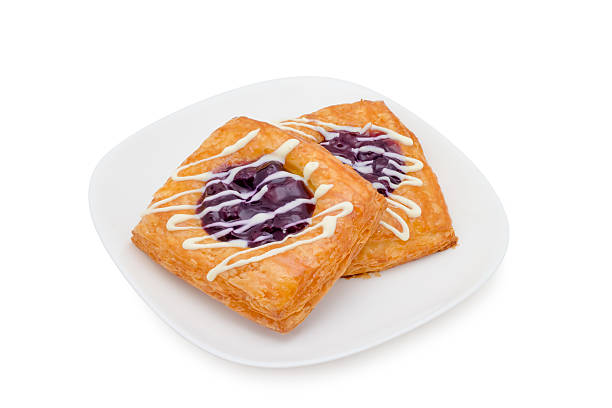 istock danish pastry with blueberry on white background 530403279