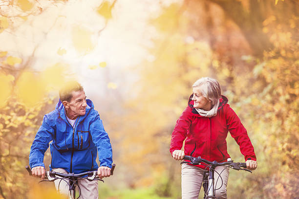 istock Active seniors riding bike 530403797