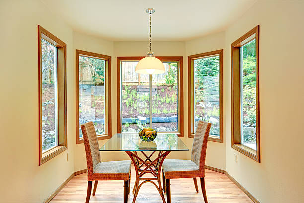 istock Cozy dinig area by the round wall with windows. 530404461