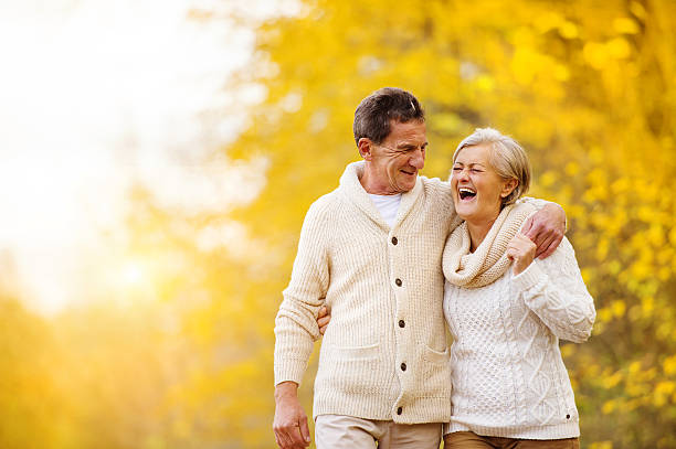 istock Active seniors walk in nature 530404581
