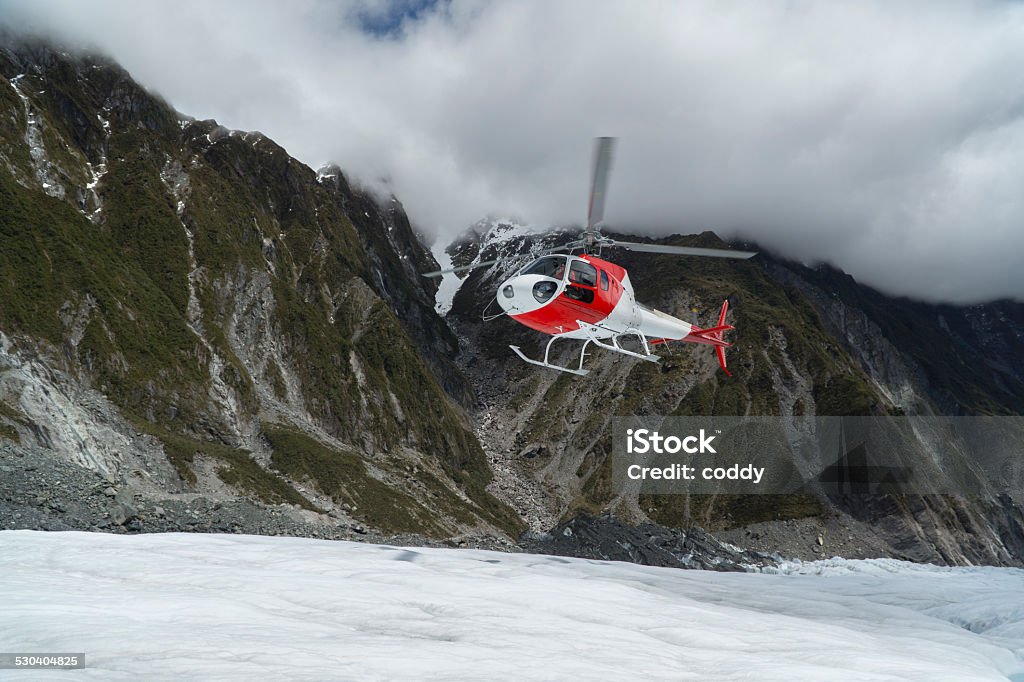 Helicopter landing on Franz Josef Glacier Helicopter landing on Franz Josef Glacier, South Island. Franz Josef Glacier Stock Photo