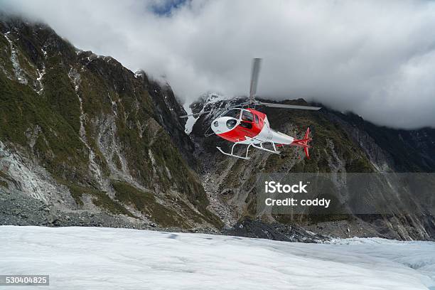 Helicopter Landing On Franz Josef Glacier Stock Photo - Download Image Now - Franz Josef Glacier, Helicopter, Snow