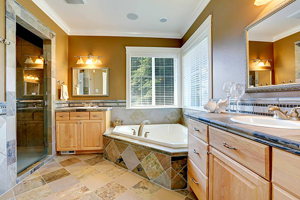 istock Luxury bathroom interior with corner bath tub 530405523