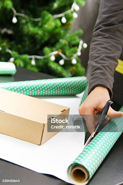 Wrapping Christmas Gifts Stock Photo - Download Image Now - Adult, Adults Only, Box - Container