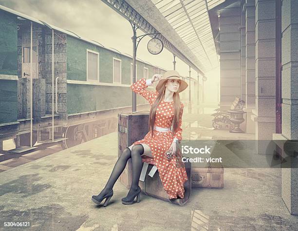 The Girl Sitting On The Suitcase Stock Photo - Download Image Now - Retro Style, Station, Steam Train