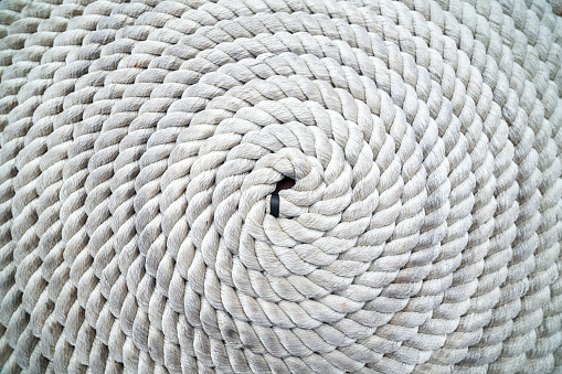 Long rope coiled on dock
