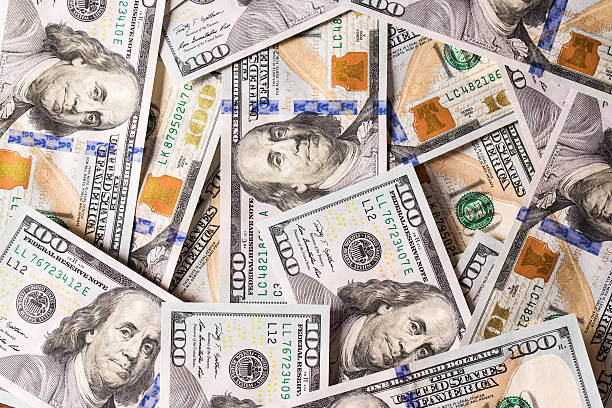 istock Background with money american hundred dollar bills 530410428
