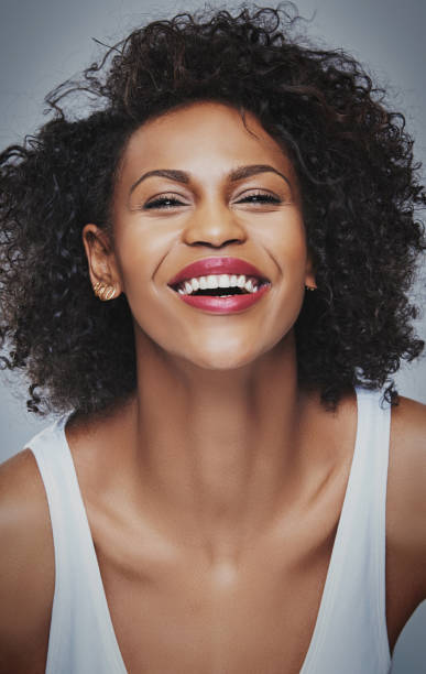 istock Close up of laughing female leaning forward 530411698