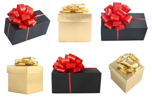 Golden and black gift boxes set Isolated on white background