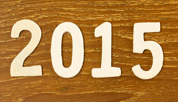 istock 2015 Year Wooden text background 530411913