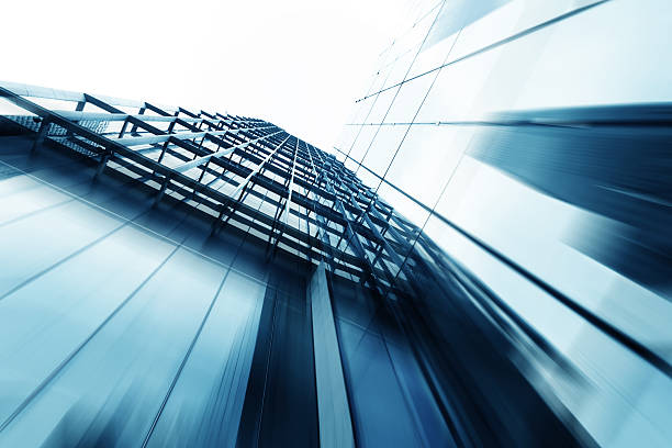 istock up looking the modern business office building exterior and sky 530412265