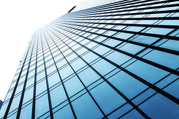 istock up looking the modern business office building exterior and sky 530412271