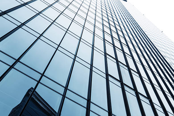 istock up looking the modern business office building exterior and sky 530412273
