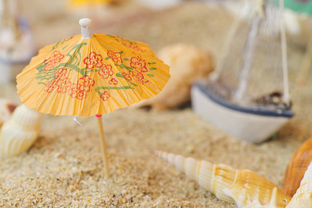 istock Boat and sea shells sandy tropical beach. 530413328