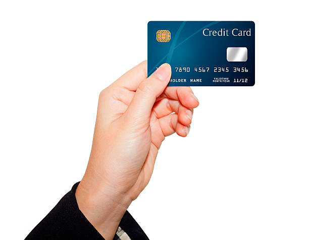 istock hand holding credit card 530413915